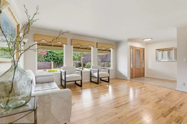 a view of a dining table and chairs in a room