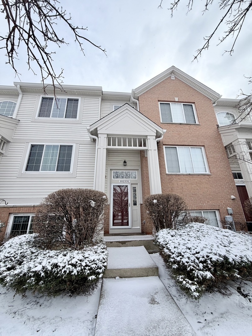 10233 Concord Lane, Unit C Bridgeview, IL 60455 - Photo 2 of 23 a front view of a house