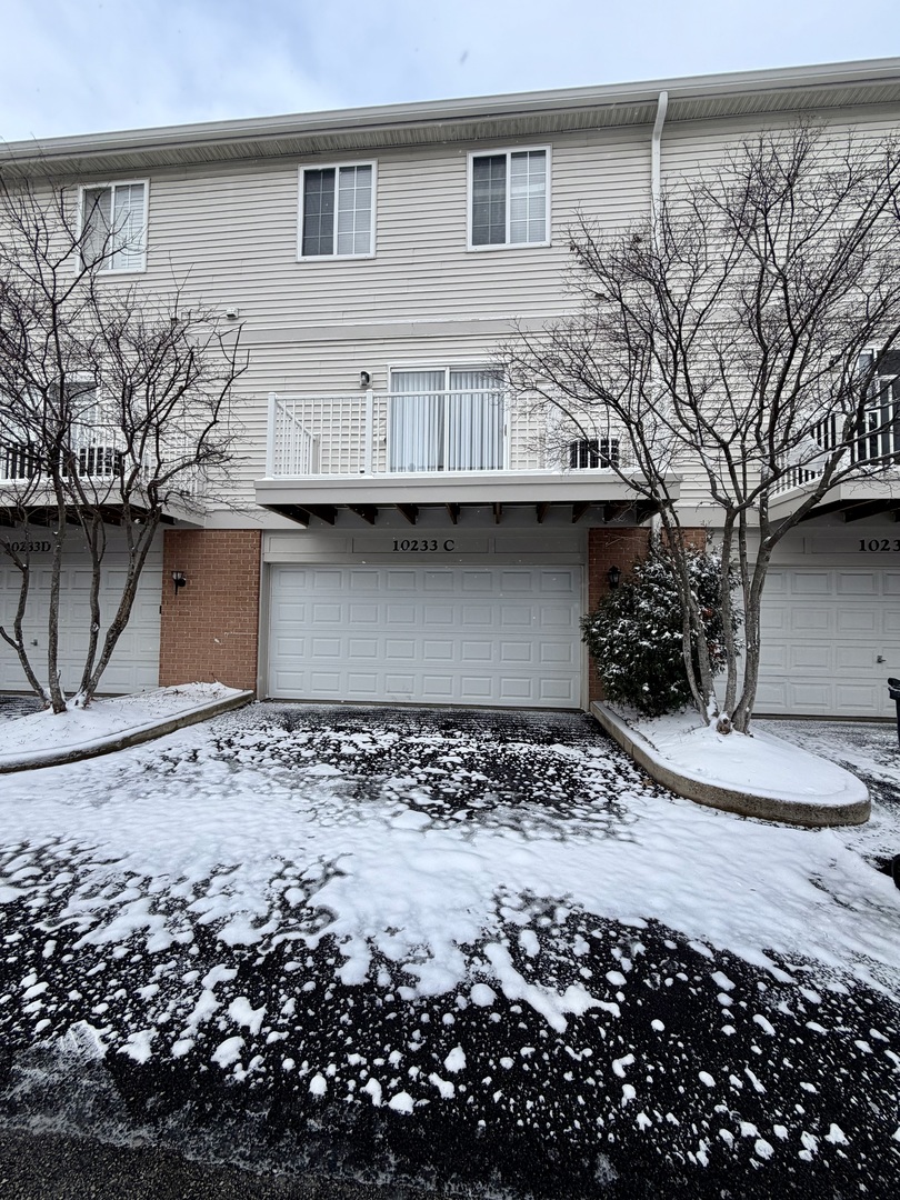 10233 Concord Lane, Unit C Bridgeview, IL 60455 - Photo 23 of 23 a view of a house with a yard