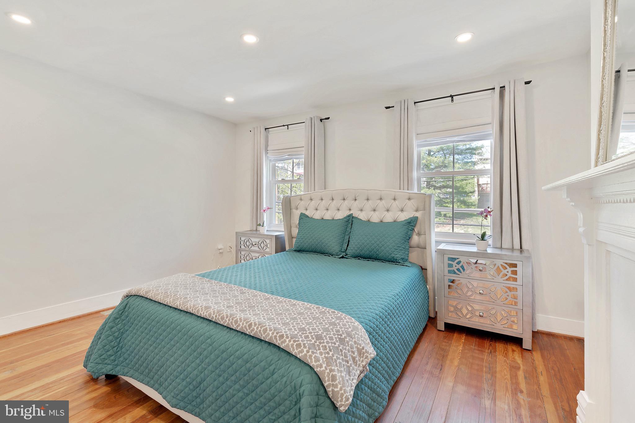 8725 Frederick Road Ellicott City, MD 21043 - Photo 13 of 32 bright owner's bedroom with vintage flooring