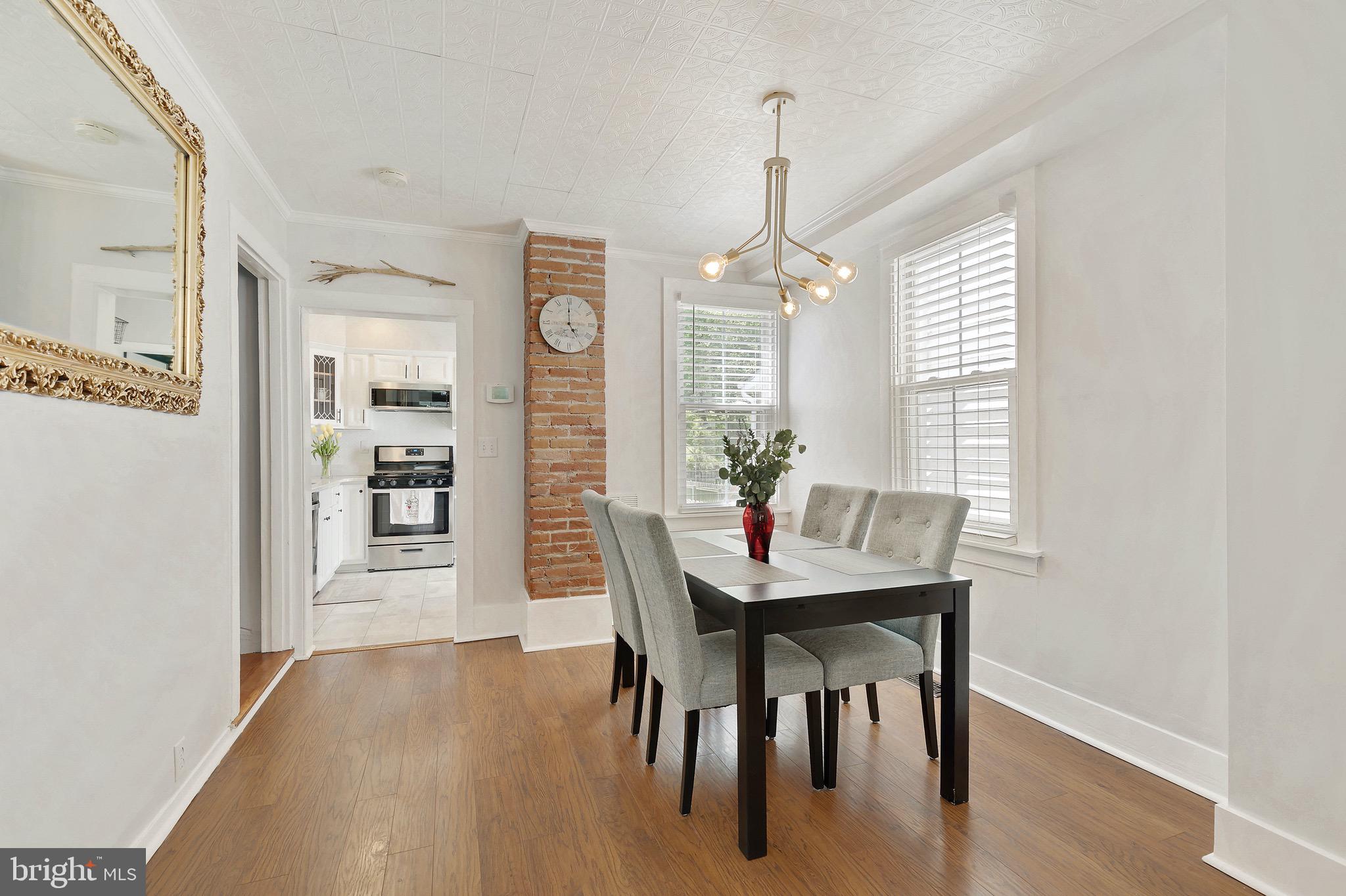 8725 Frederick Road Ellicott City, MD 21043 - Photo 5 of 32 Exposed brick adds the perfect amount of character