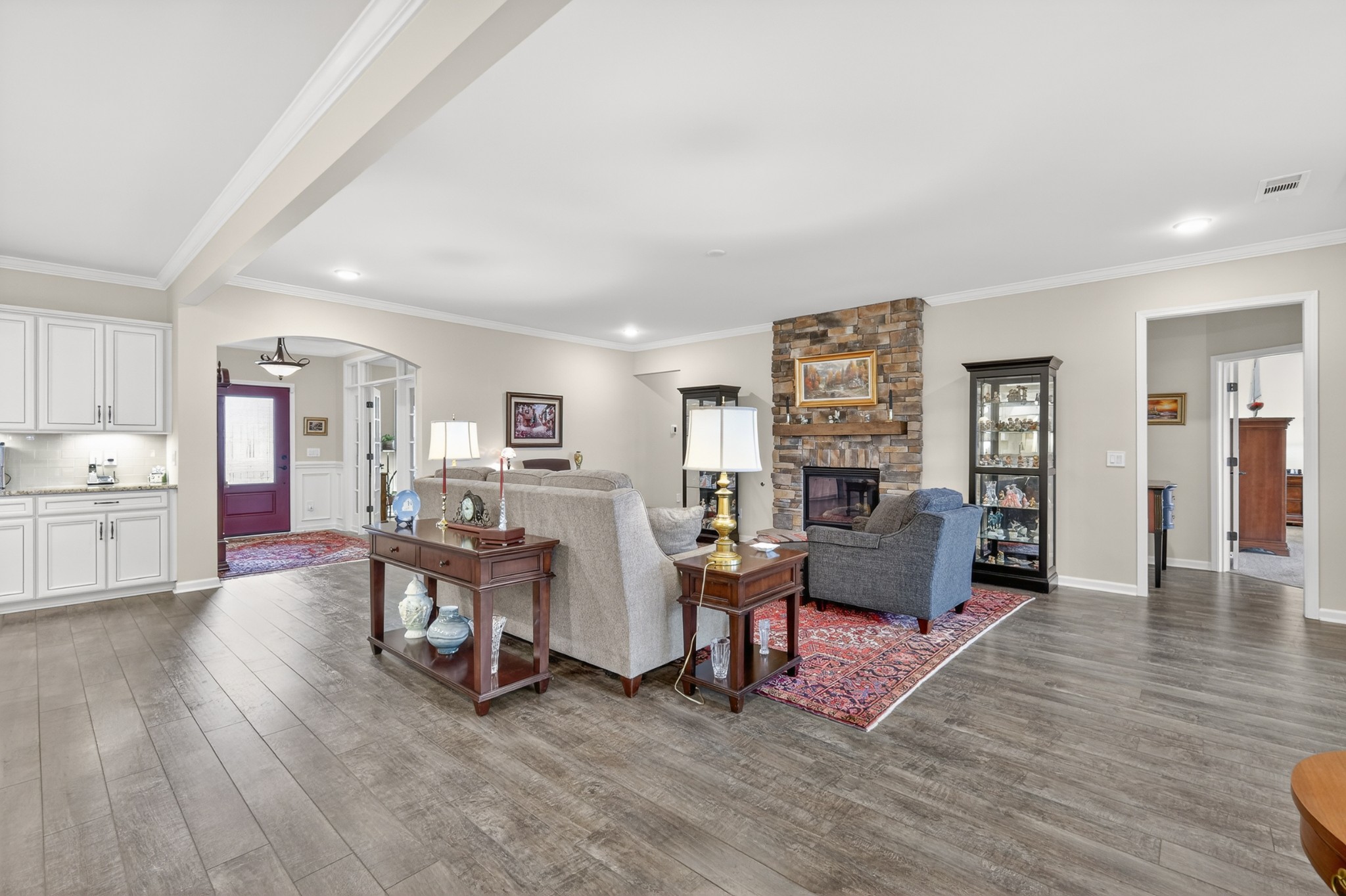 1024 Coffee Ridge Spring Hill, TN 37174 - Photo 11 of 46 a living room with furniture and a wooden floor