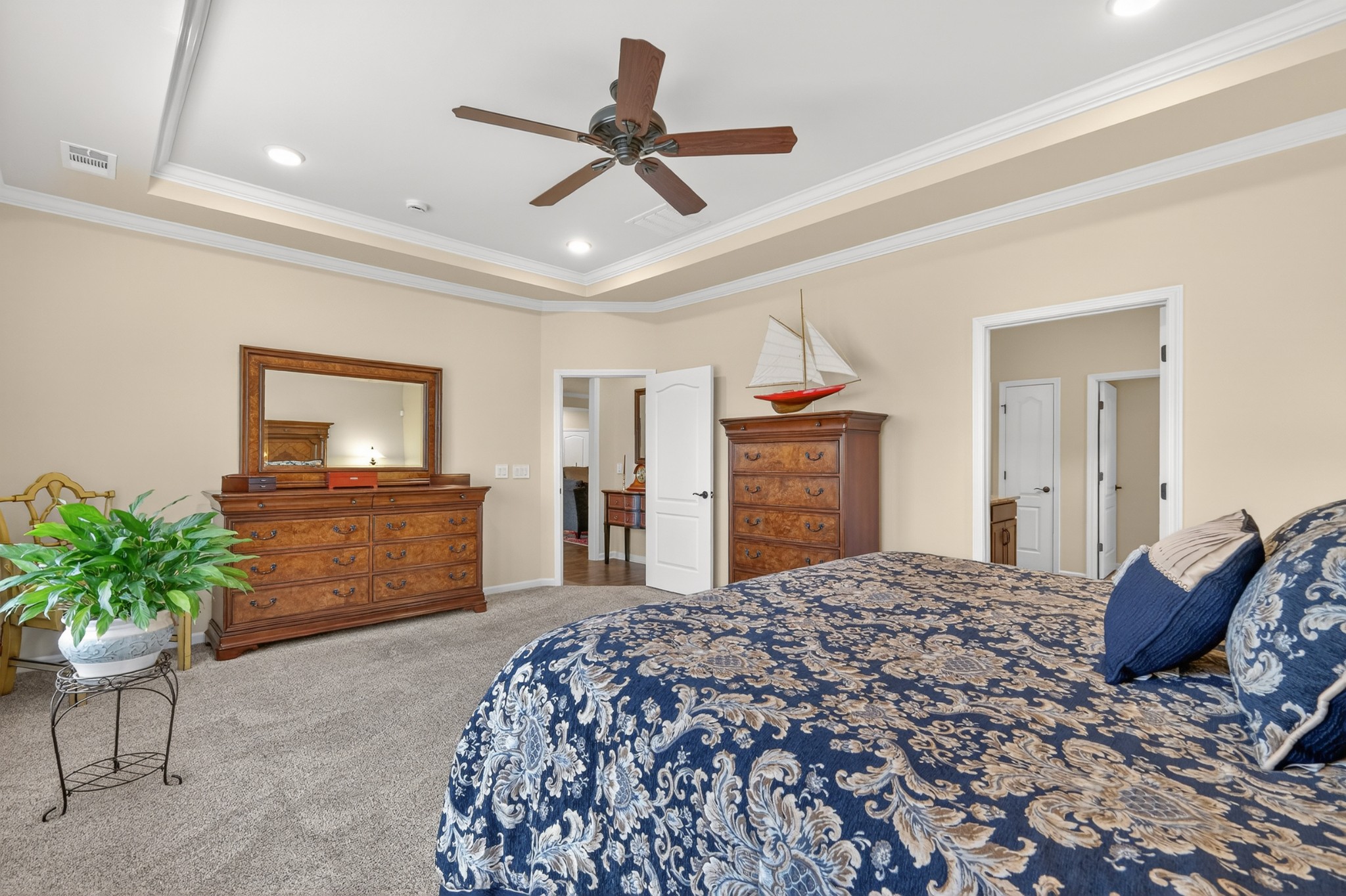 1024 Coffee Ridge Spring Hill, TN 37174 - Photo 26 of 46 a bedroom with a bed and a dresser