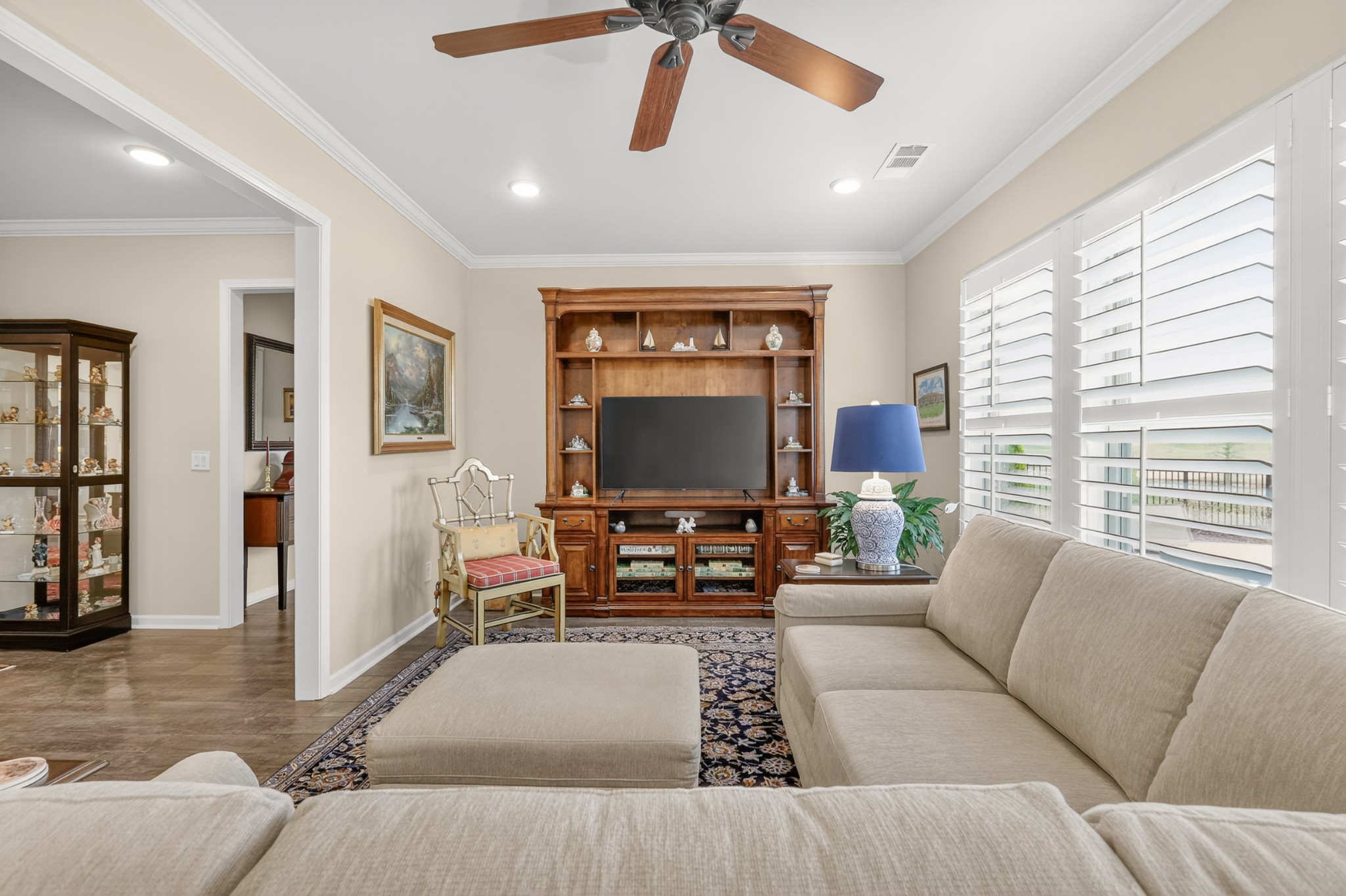1024 Coffee Ridge Spring Hill, TN 37174 - Photo 30 of 46 a living room with furniture and a flat screen tv