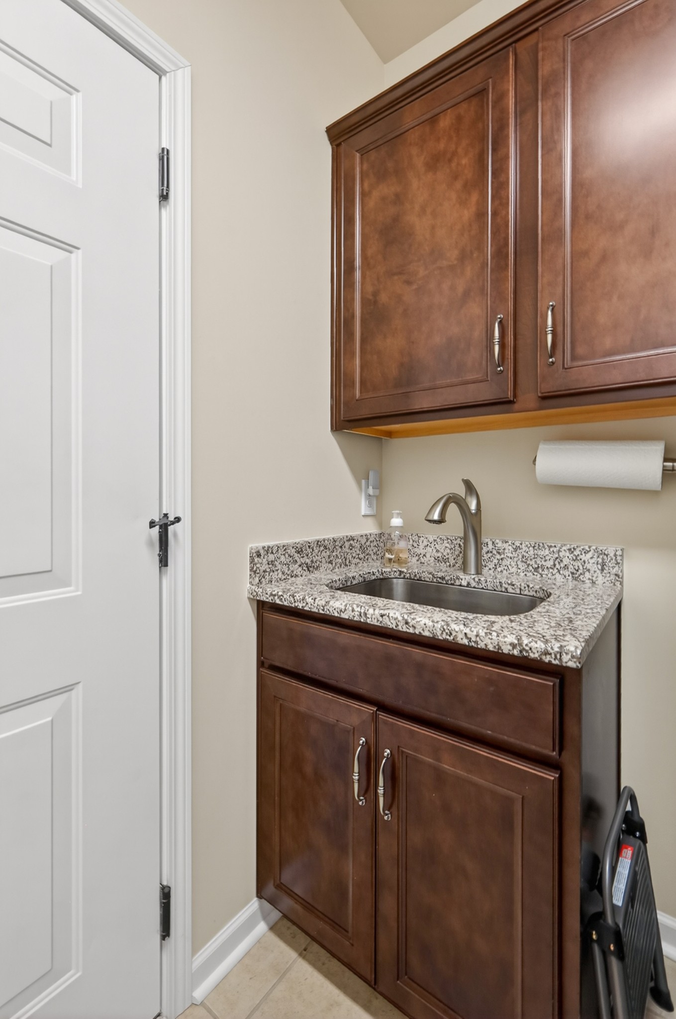 1024 Coffee Ridge Spring Hill, TN 37174 - Photo 35 of 46 a bathroom with a granite countertop sink and a mirror