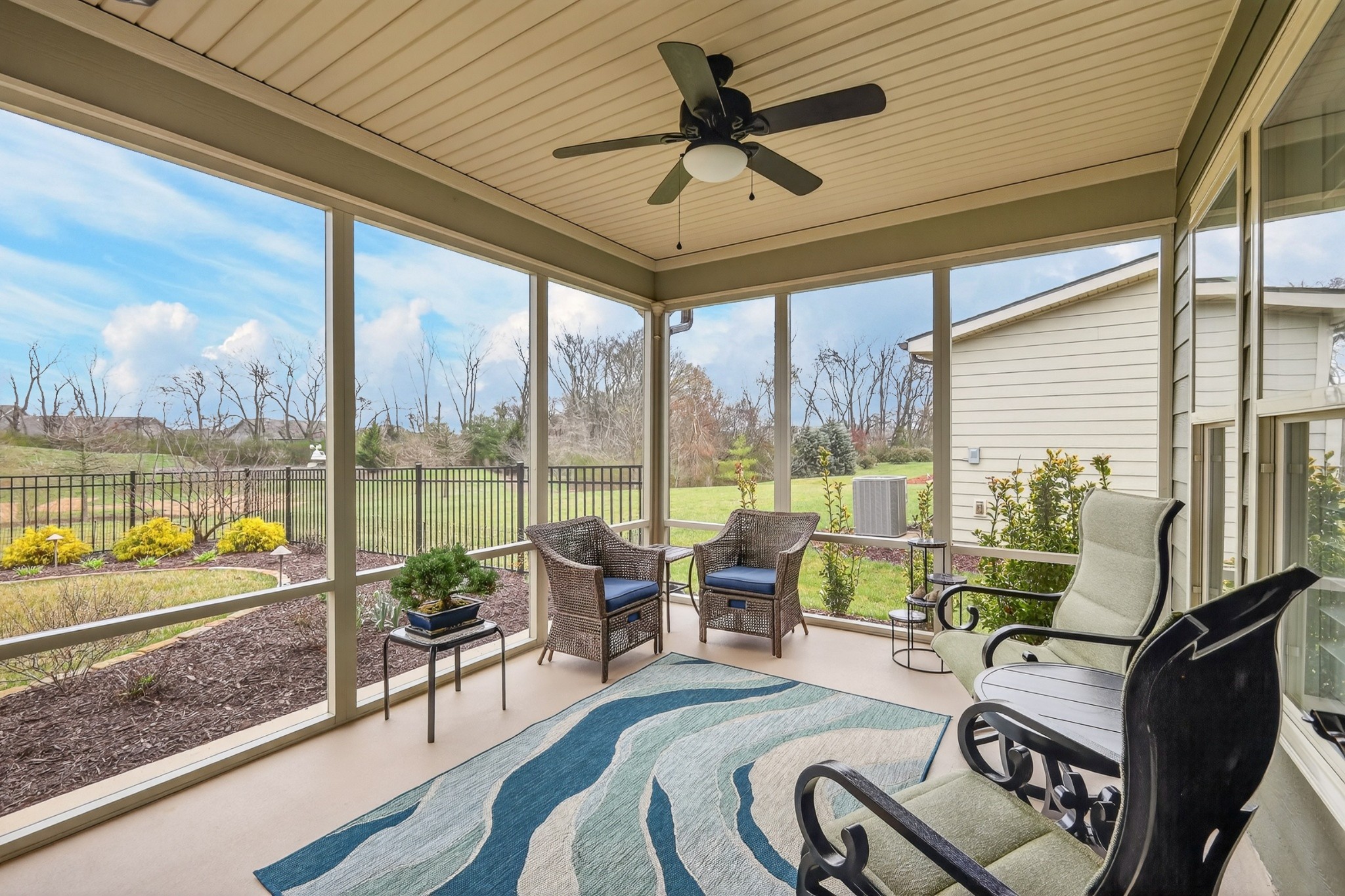 1024 Coffee Ridge Spring Hill, TN 37174 - Photo 36 of 46 a living room with furniture and a floor to ceiling window