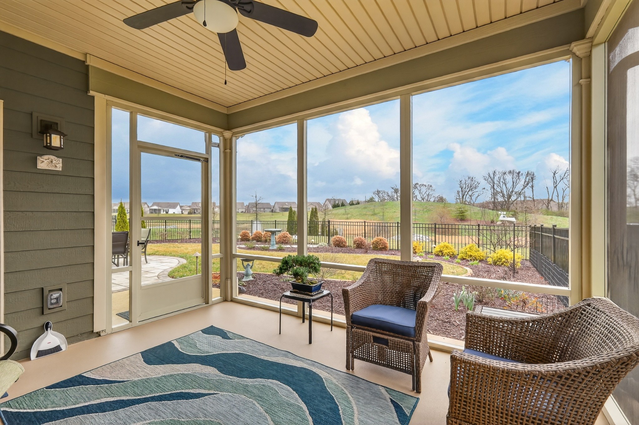 1024 Coffee Ridge Spring Hill, TN 37174 - Photo 37 of 46 a living room with furniture and a floor to ceiling window