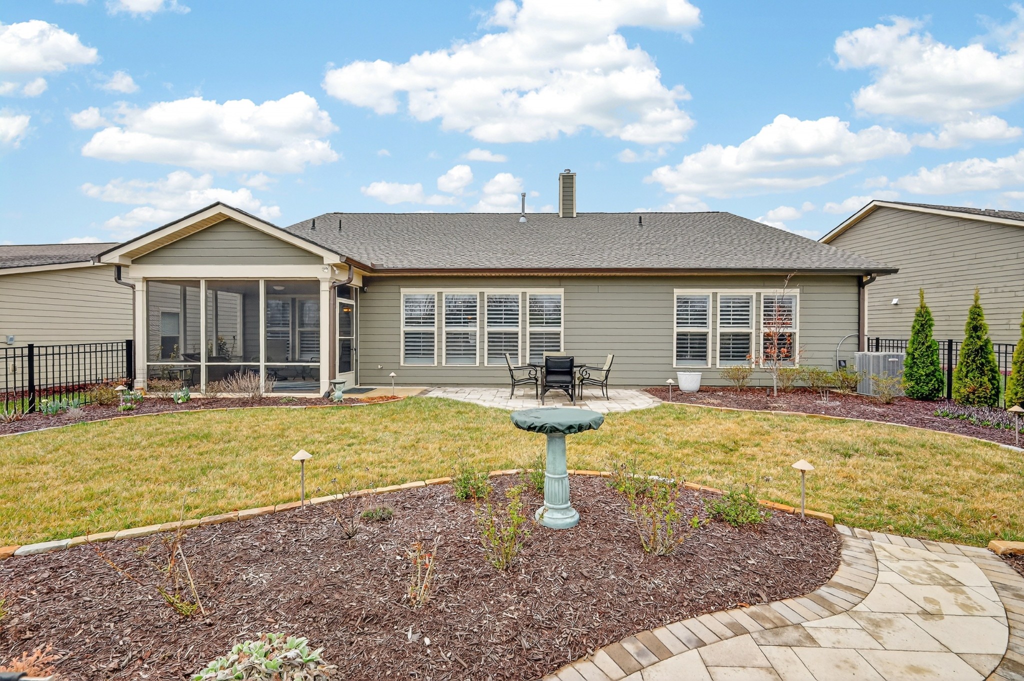 1024 Coffee Ridge Spring Hill, TN 37174 - Photo 38 of 46 a front view of a house with swimming pool and porch
