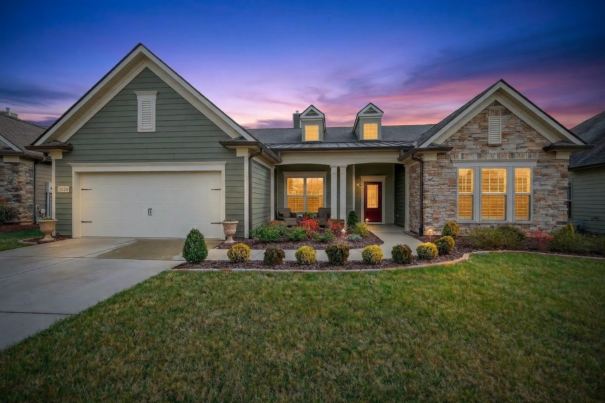 1024 Coffee Ridge Spring Hill, TN 37174 - Photo 5 of 46 a front view of a house with garden