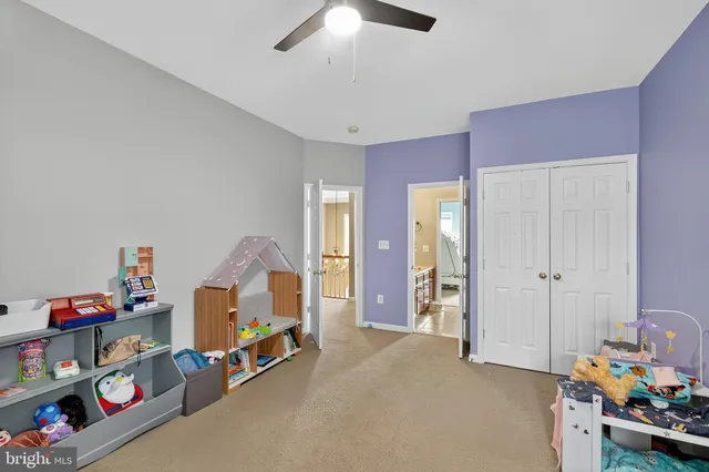 a bedroom with a bed bed and a window