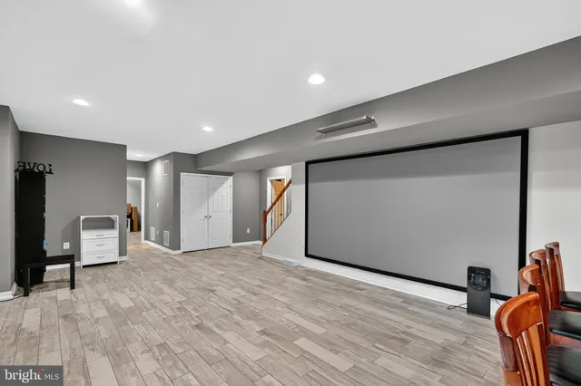 a kitchen with sink stove and cabinets