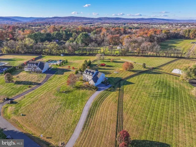 a view of a swimming pool with an ocean view