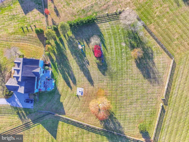 a view of swimming pool with seating area