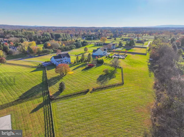 a view of a swimming pool with an ocean view