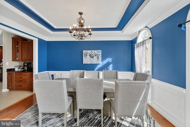 a kitchen with stainless steel appliances granite countertop a stove and a refrigerator