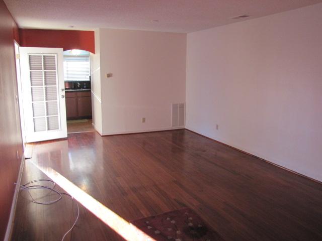 Door out to patio. Room for dining area at end of living room.
