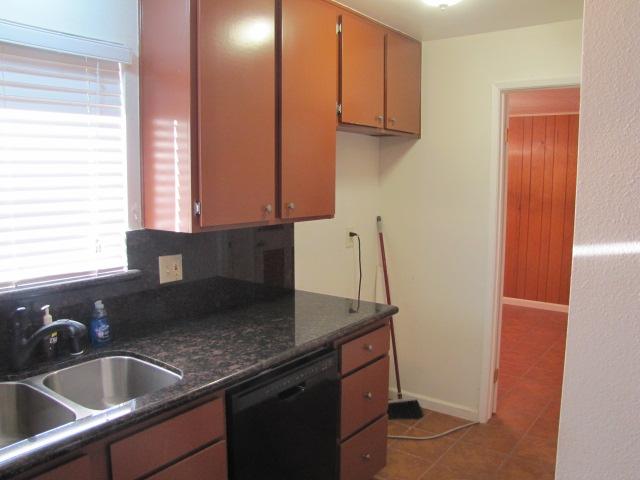 1355 Panorama Ridge Road Oceanside, CA 92056 - Photo 8 of 25 Double stainless steel sink & tile flooring