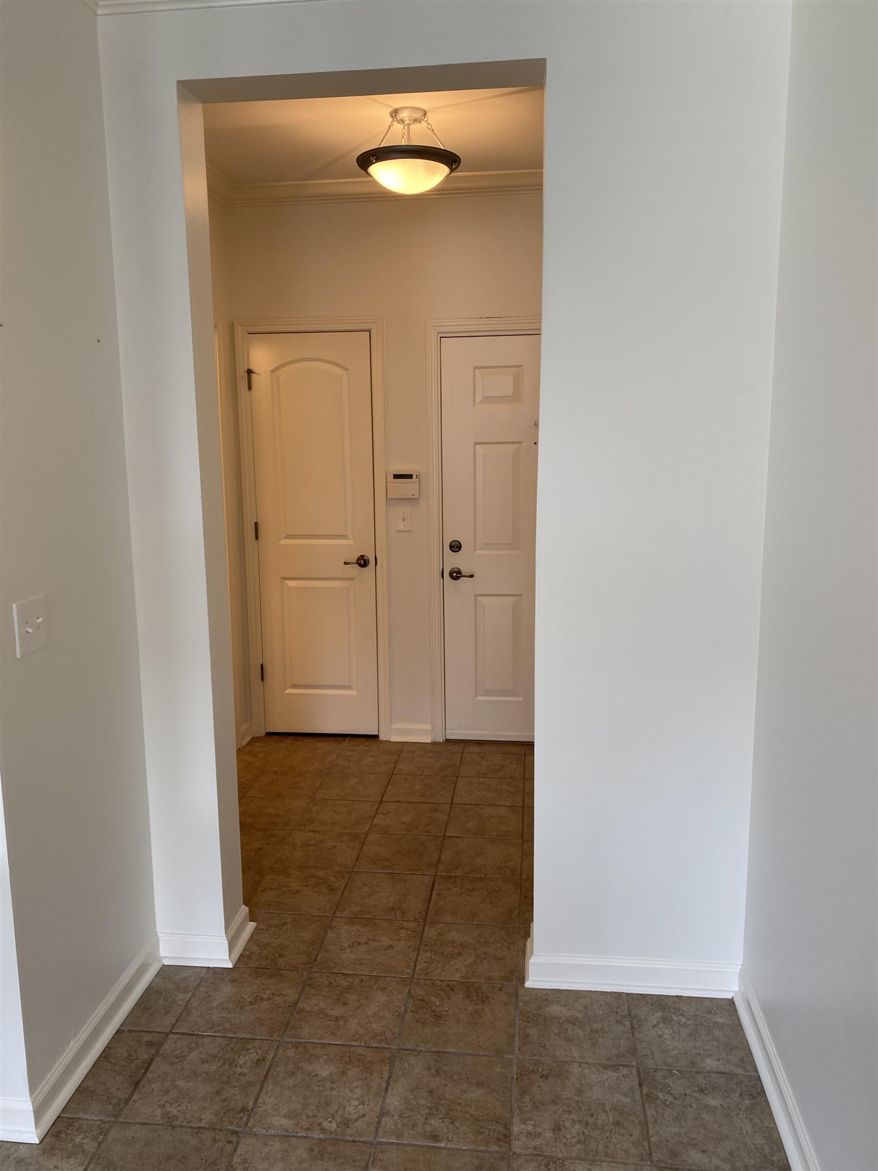 730 Litty Court, Unit 101 Memphis, TN 38103 - Photo 12 of 22 a view of a hallway with wooden door