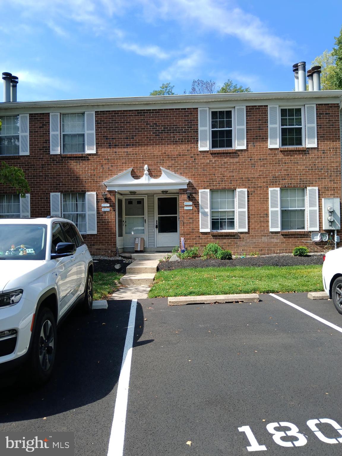 a house view with a garden space