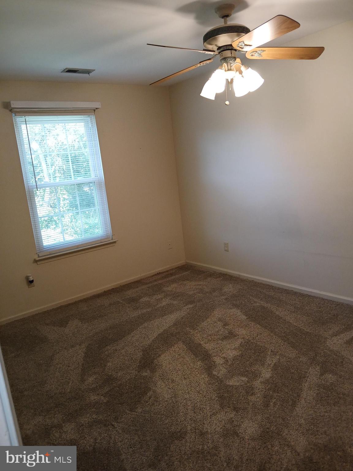 1803 Huntingdon Mews Clementon, NJ 08021 - Photo 5 of 9 an empty room with a window