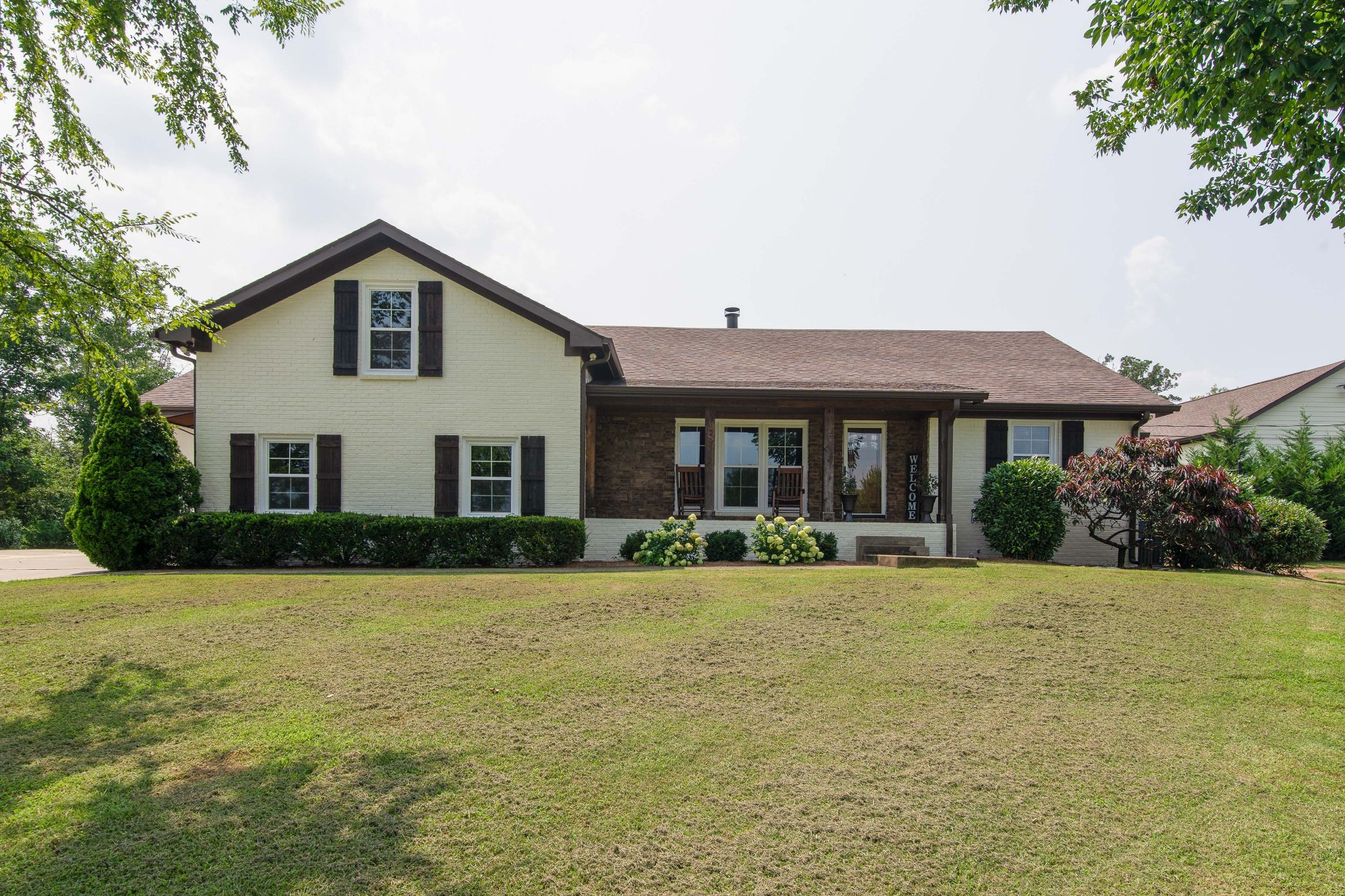 6249 Ladd Road Franklin, TN 37067 - Photo 1 of 50 a front view of a house with a yard