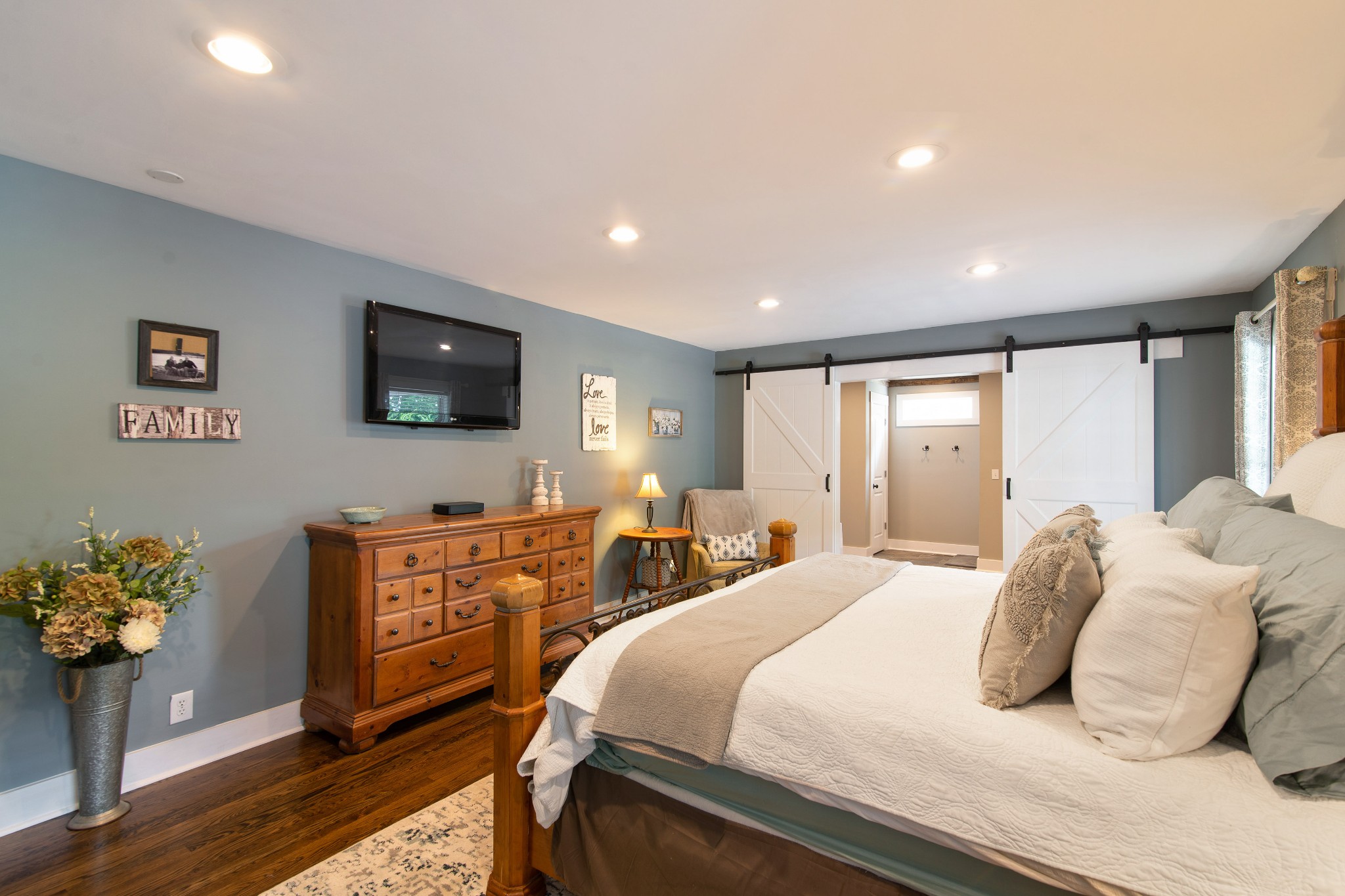 6249 Ladd Road Franklin, TN 37067 - Photo 17 of 50 a bedroom with a bed and a tv