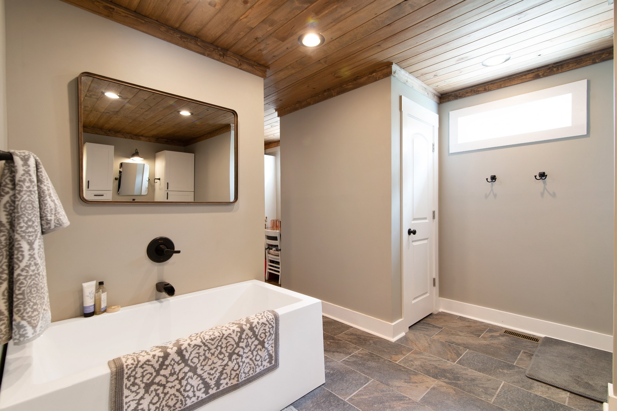6249 Ladd Road Franklin, TN 37067 - Photo 20 of 50 a bedroom with a bed and a large mirror