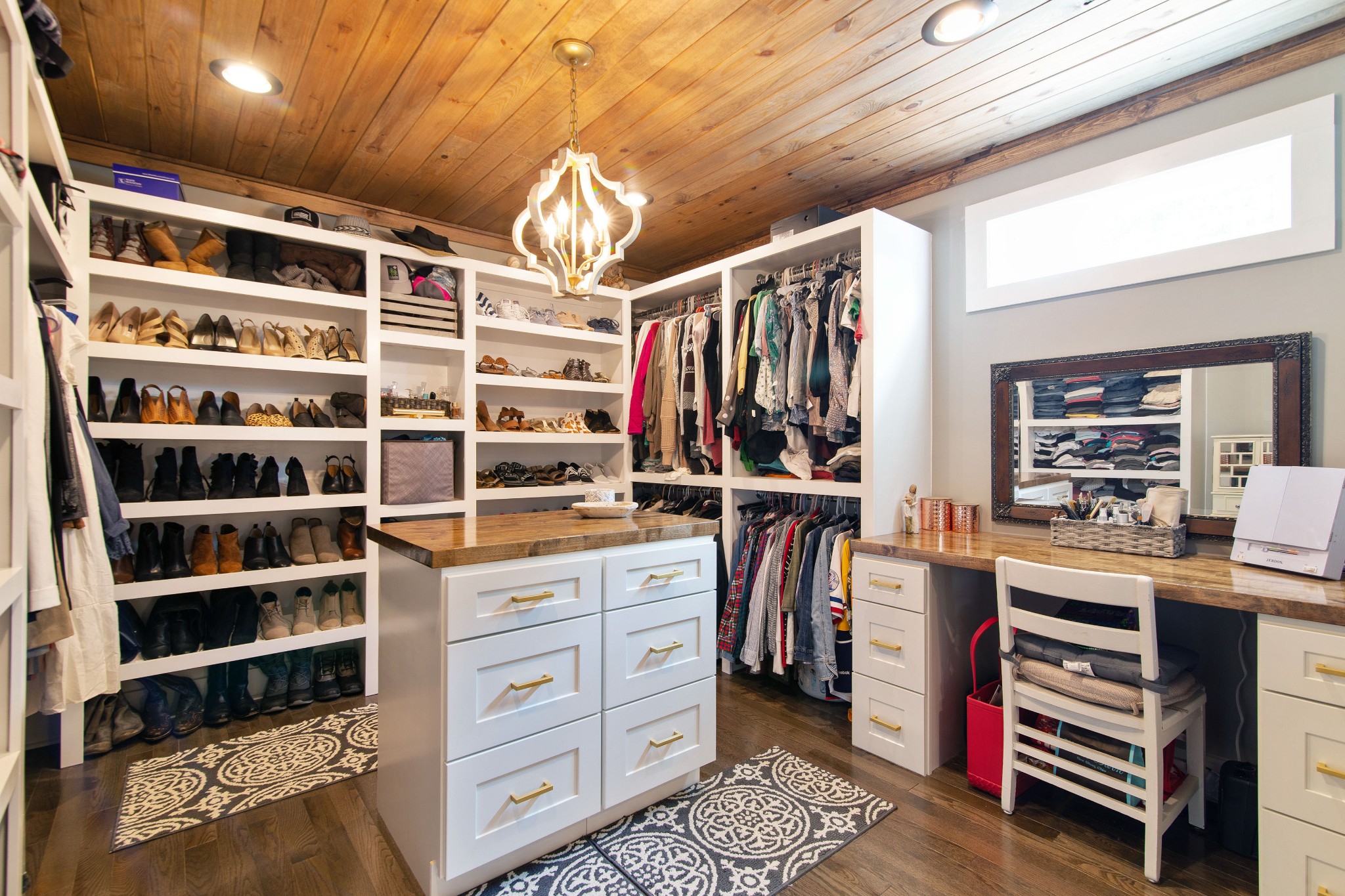 6249 Ladd Road Franklin, TN 37067 - Photo 23 of 50 a view of walk in closet with clothes and shoes