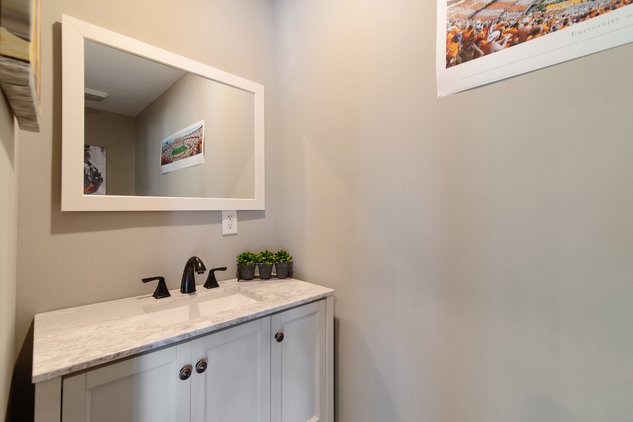6249 Ladd Road Franklin, TN 37067 - Photo 34 of 50 a bathroom with a granite countertop sink and a mirror