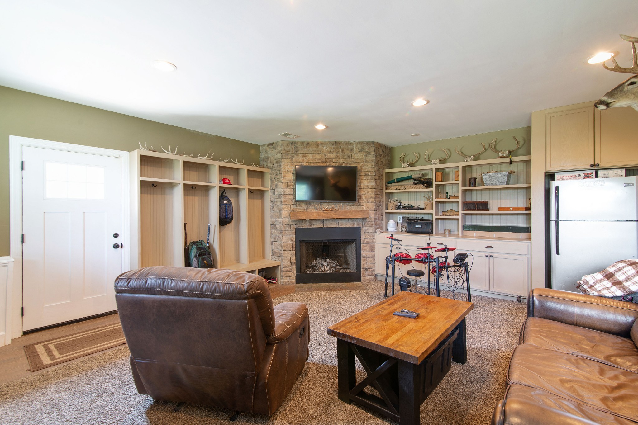 6249 Ladd Road Franklin, TN 37067 - Photo 35 of 50 a living room with furniture and a fireplace