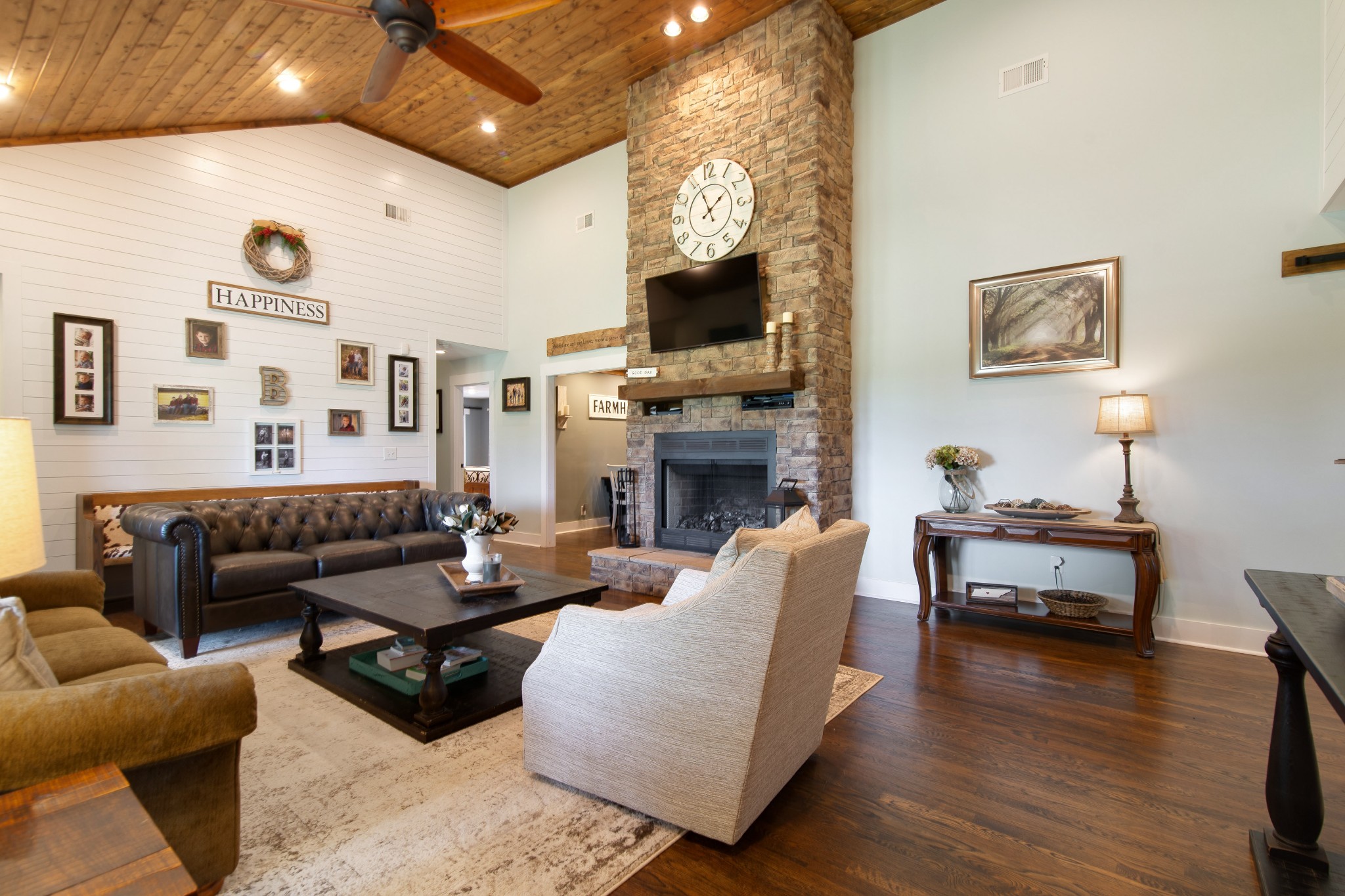 6249 Ladd Road Franklin, TN 37067 - Photo 5 of 50 a living room with fireplace furniture and a flat screen tv