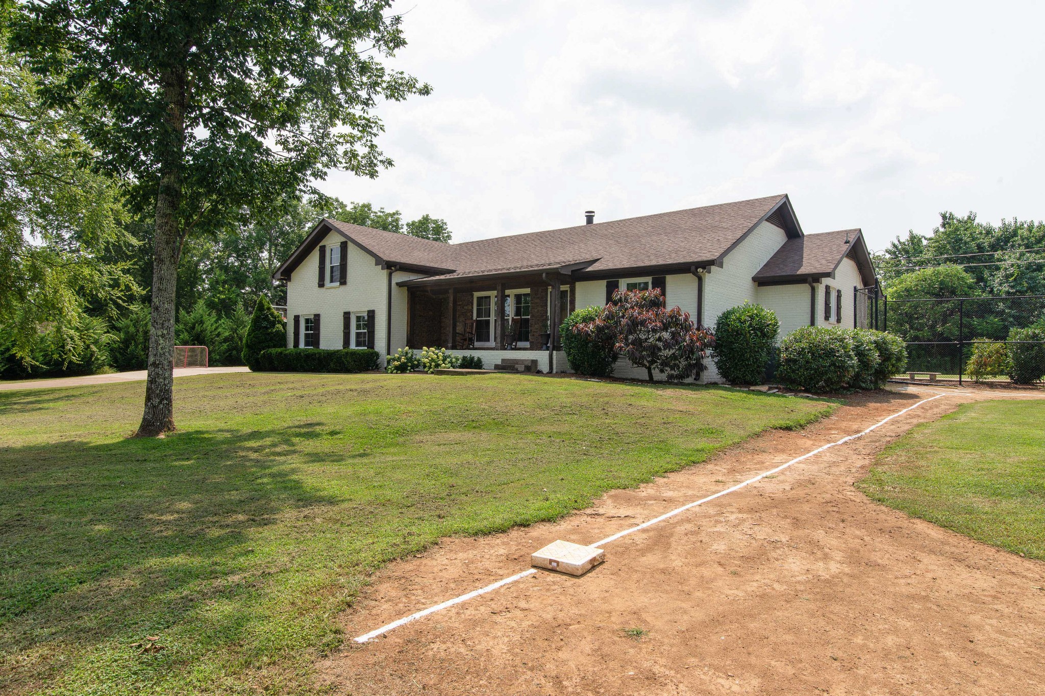 6249 Ladd Road Franklin, TN 37067 - Photo 44 of 50 a front view of house with yard and green space
