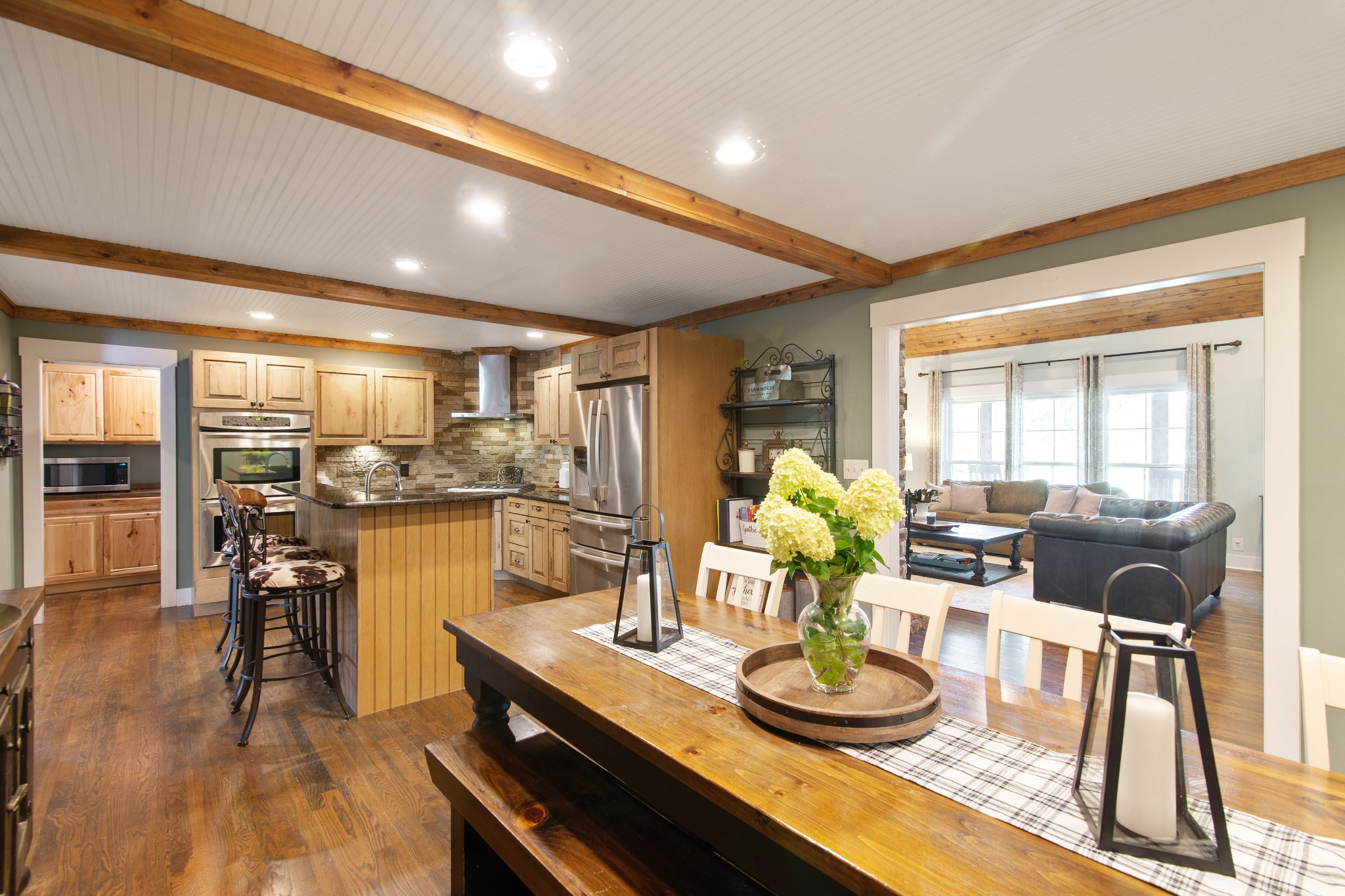 6249 Ladd Road Franklin, TN 37067 - Photo 10 of 50 a room with stainless steel appliances furniture dining table and wooden floor