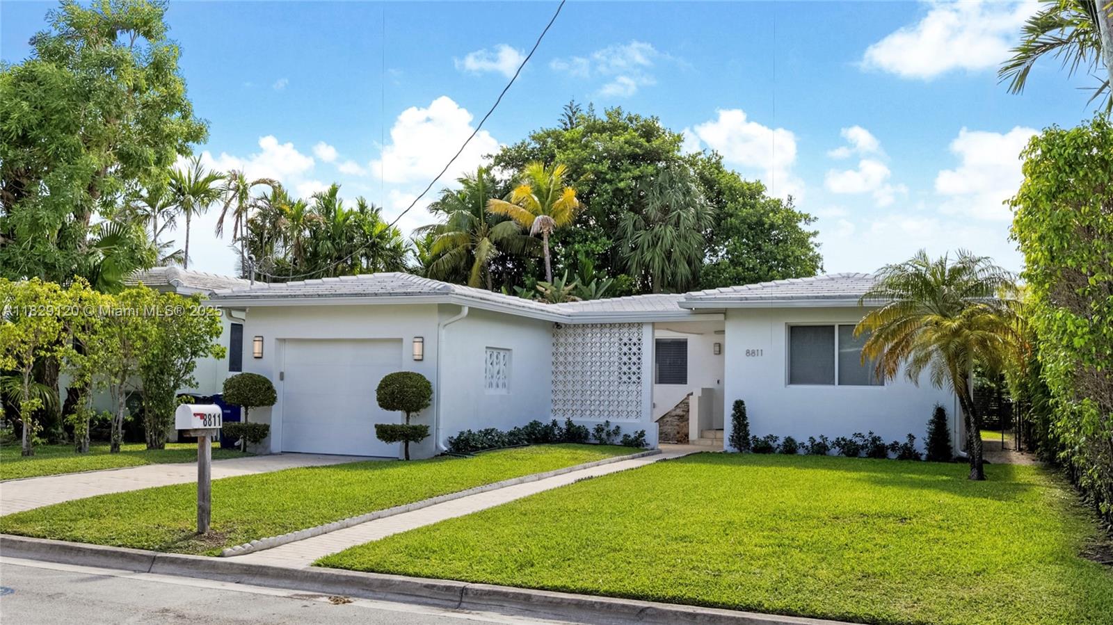 8811 Hawthorne Avenue Surfside, FL 33154 - Photo 2 of 47 a view of outdoor space yard and patio