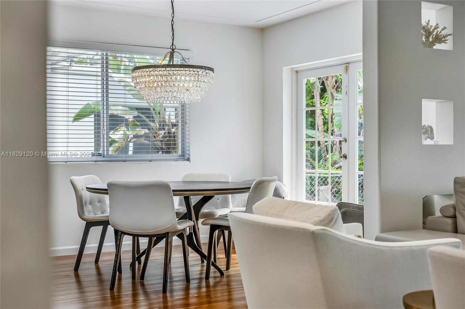 8811 Hawthorne Avenue Surfside, FL 33154 - Photo 37 of 47 a dining room with furniture and window