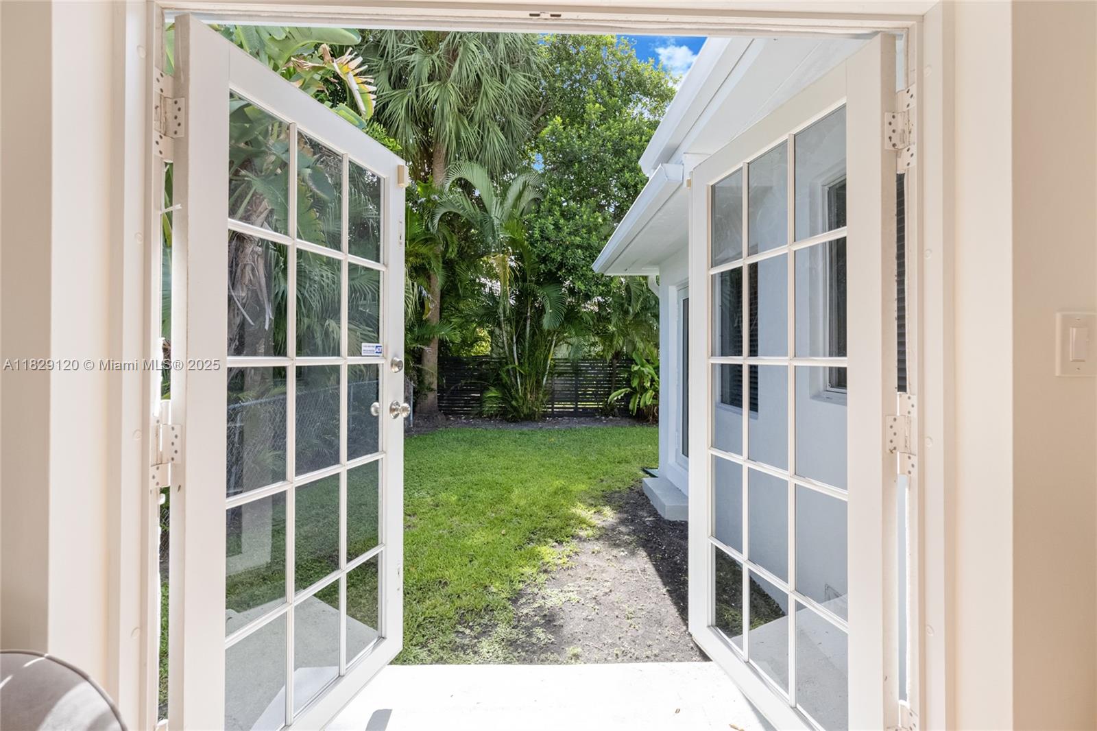 8811 Hawthorne Avenue Surfside, FL 33154 - Photo 38 of 47 a view of a door