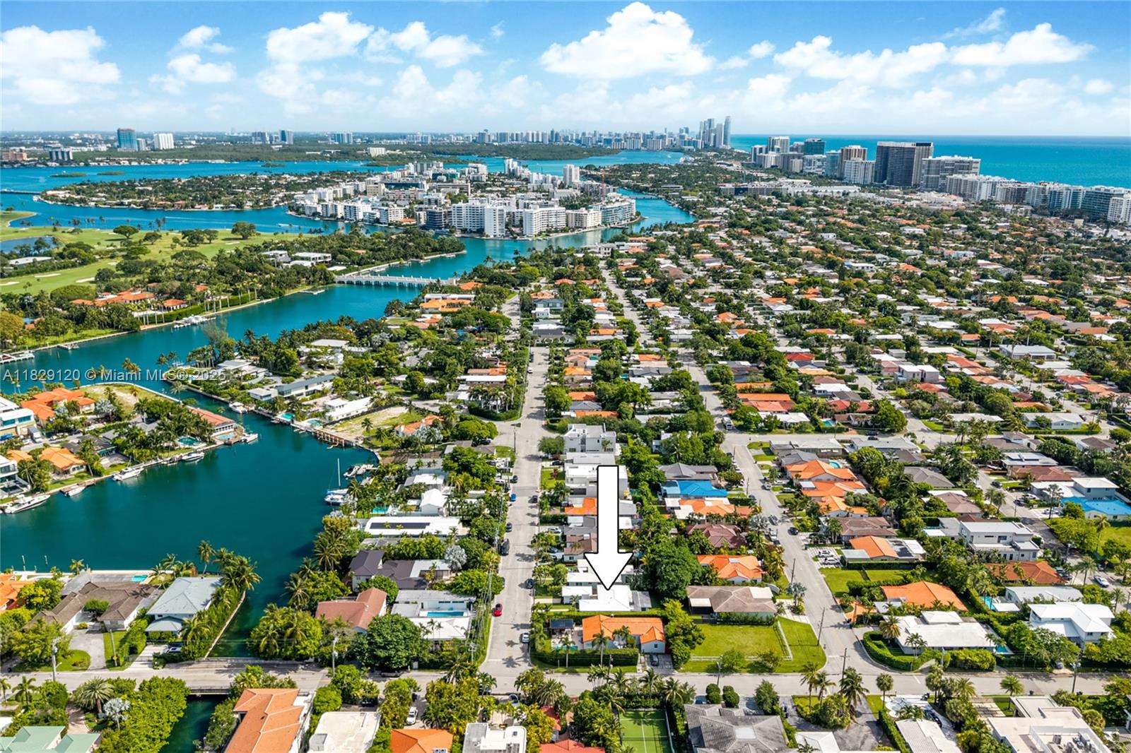 8811 Hawthorne Avenue Surfside, FL 33154 - Photo 44 of 47 an aerial view of residential building with outdoor space and lake view
