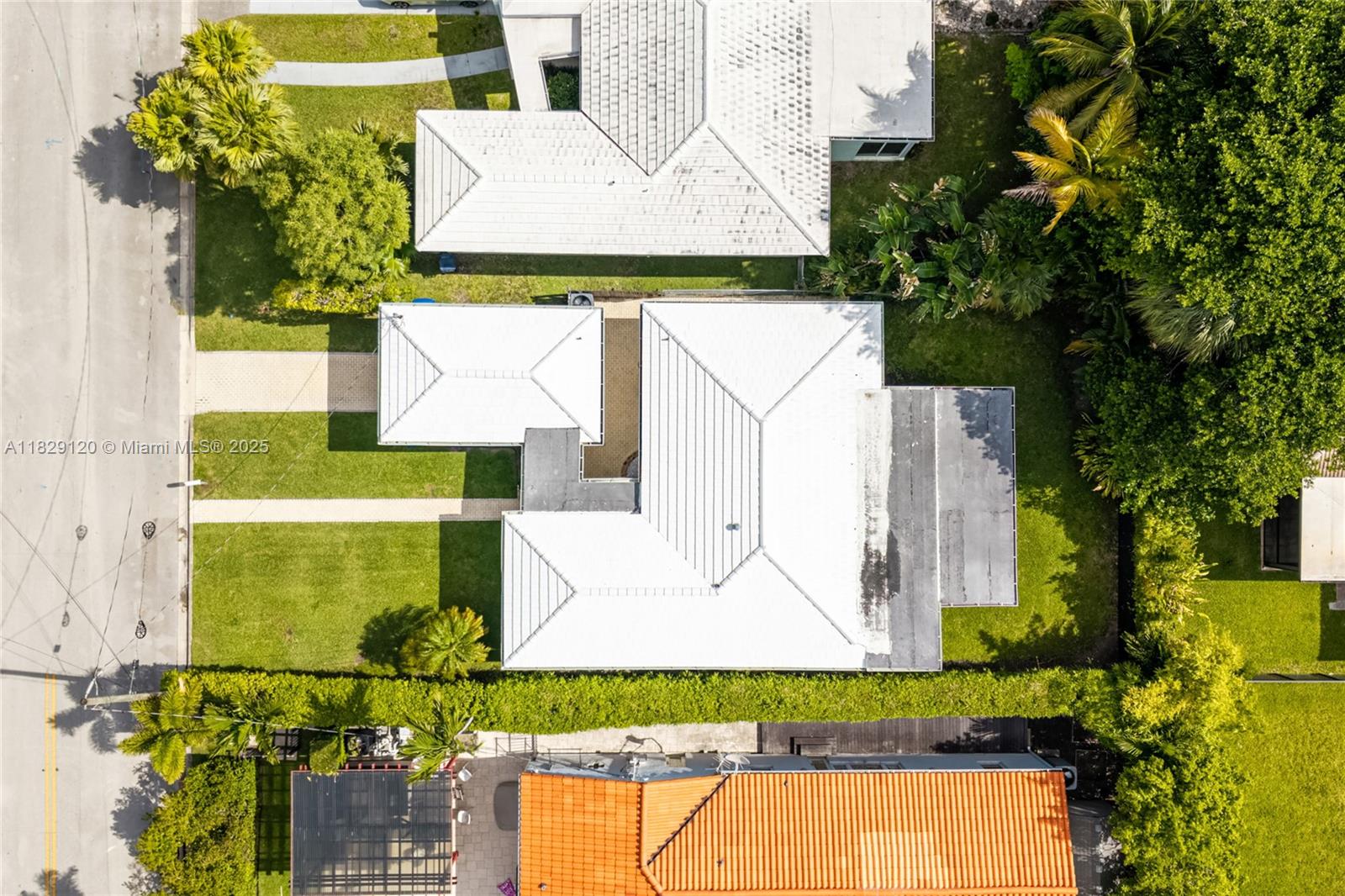 8811 Hawthorne Avenue Surfside, FL 33154 - Photo 6 of 47 an aerial view of a house with a yard