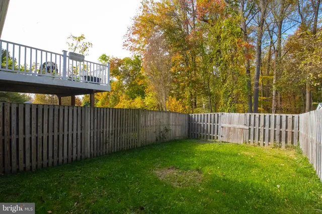 a view of a wooden fence