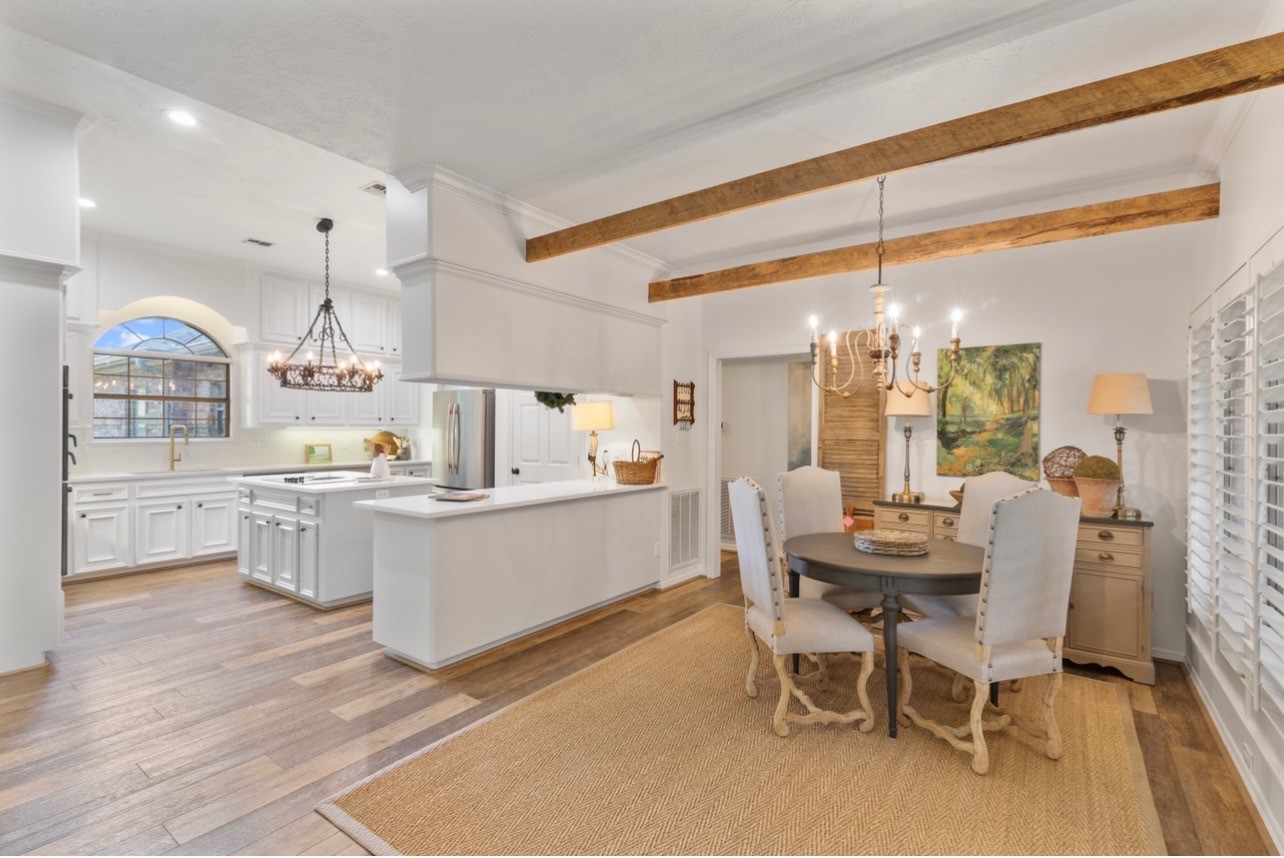 901 Longmire Road, Unit 51 Conroe, TX 77304 - Photo 3 of 48 Exquisite french old-world charm mixed with European. Contemporary.Real beams, gorgeous chandeliers added to almost every room.