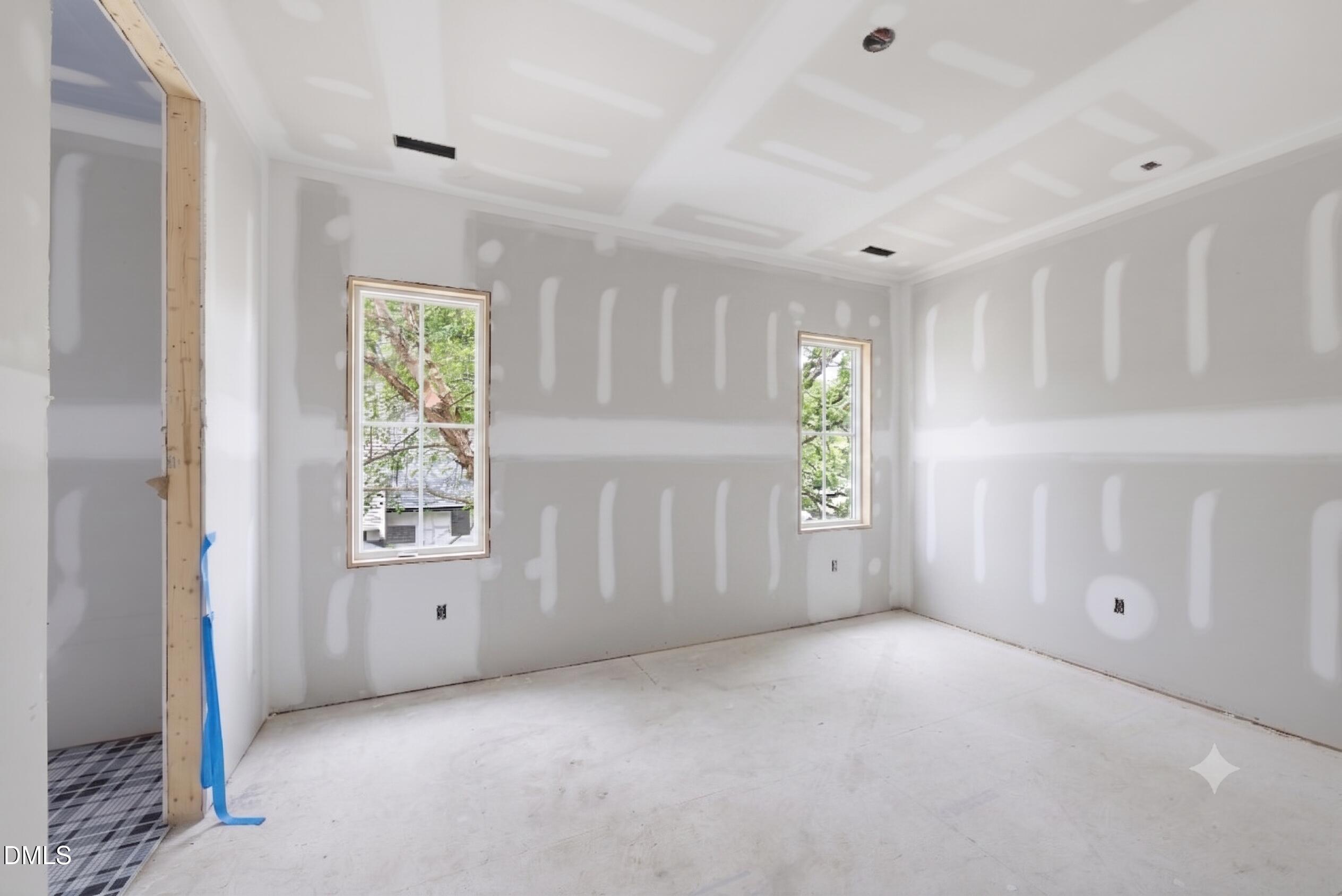 7508 Grist Mill Road Raleigh, NC 27615 - Photo 14 of 32 a view of an empty room with a window