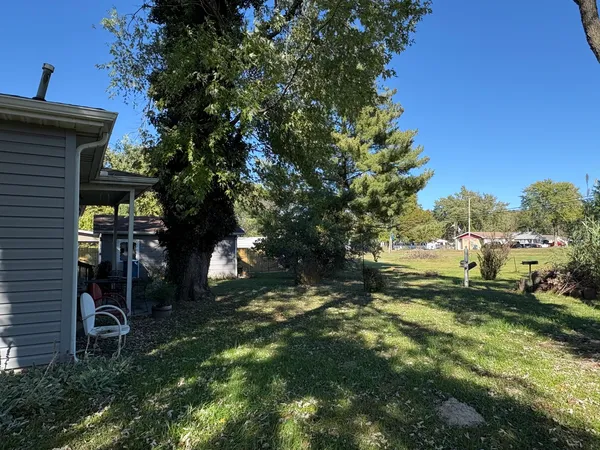 a view of outdoor space and yard