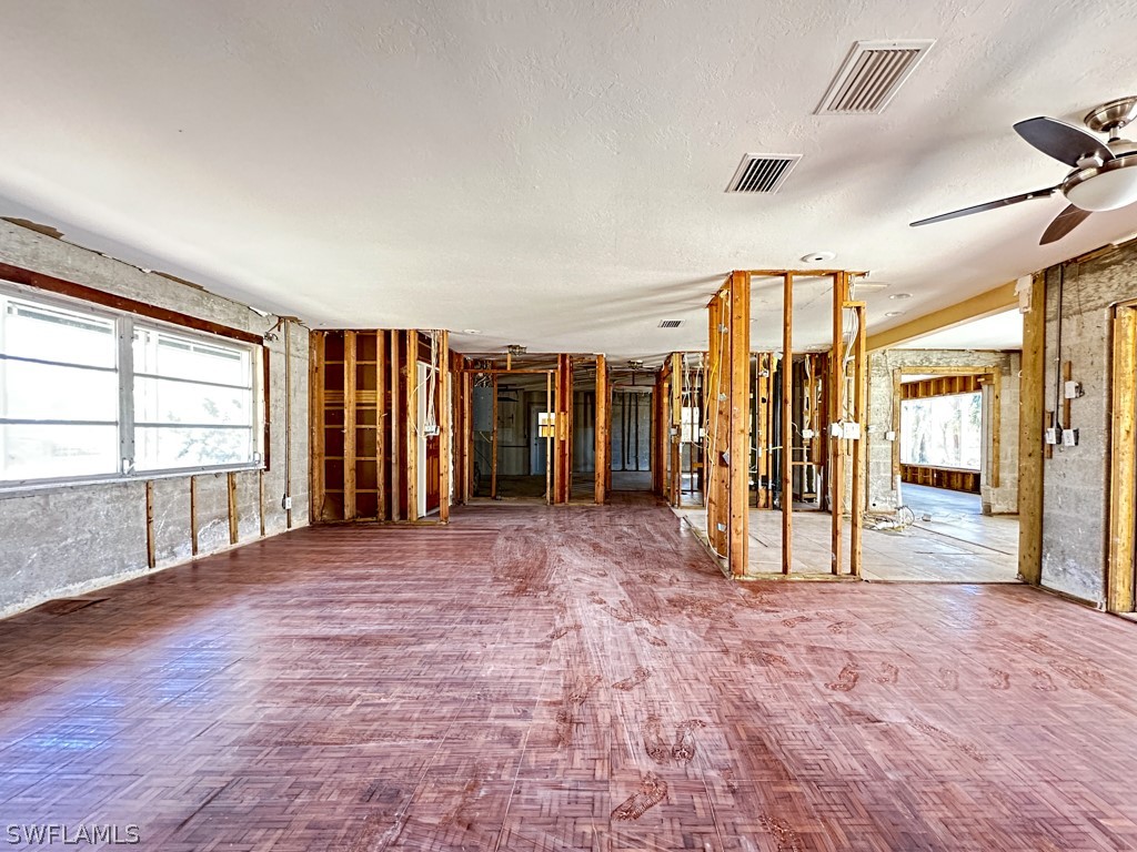 671 Rabbit Road Sanibel, FL 33957 - Photo 11 of 50 a view of an empty room with a window