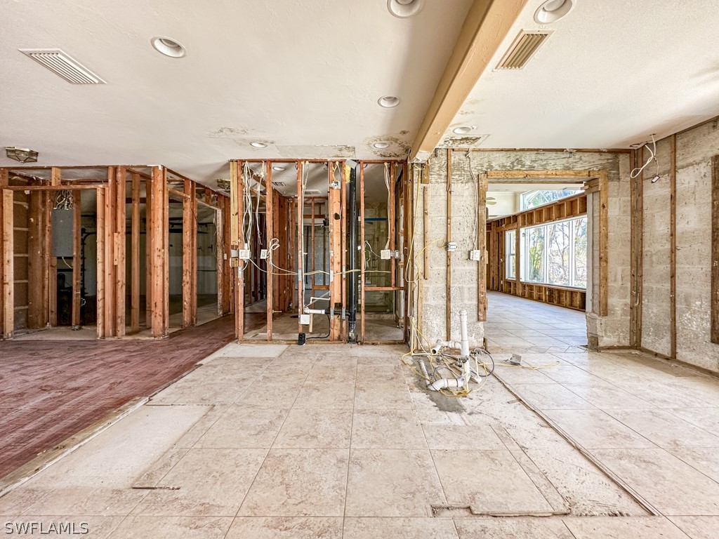 671 Rabbit Road Sanibel, FL 33957 - Photo 13 of 50 a view of livingroom with stairs