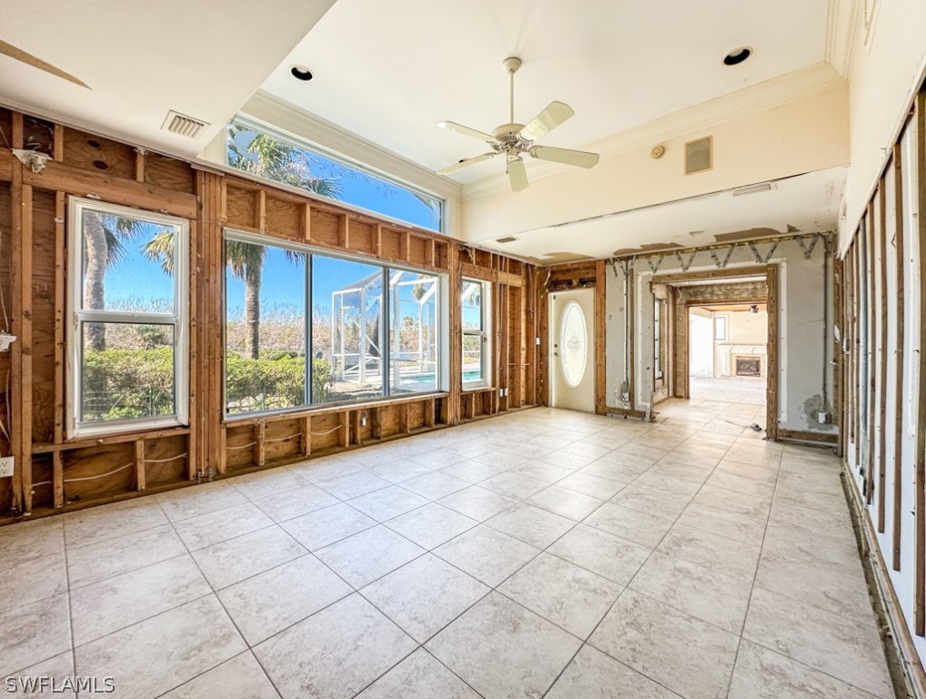 671 Rabbit Road Sanibel, FL 33957 - Photo 23 of 50 a view of an empty room with a window