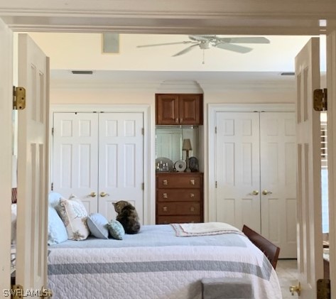 671 Rabbit Road Sanibel, FL 33957 - Photo 26 of 50 a bedroom with a bed and a dresser