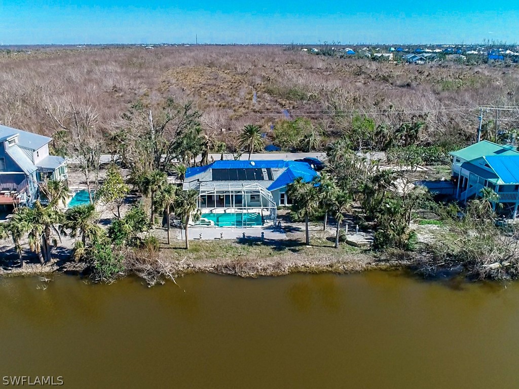 671 Rabbit Road Sanibel, FL 33957 - Photo 45 of 50 a view of a lake with a mountain