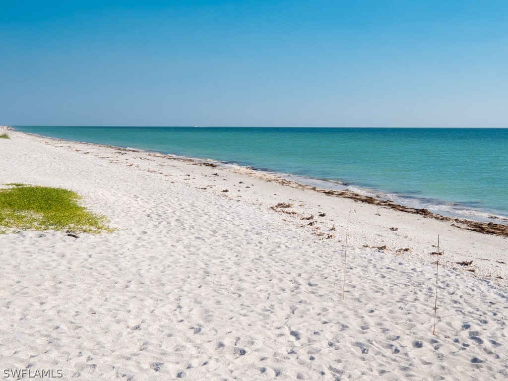 671 Rabbit Road Sanibel, FL 33957 - Photo 50 of 50 a view of a beach with a ocean view
