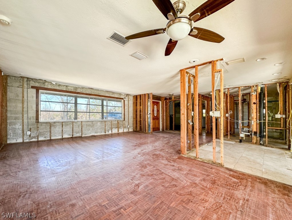 671 Rabbit Road Sanibel, FL 33957 - Photo 6 of 50 a view of an empty room with windows
