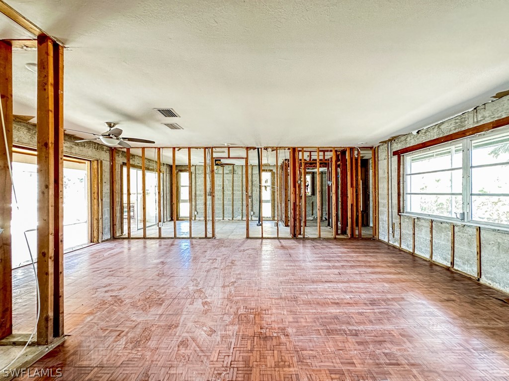671 Rabbit Road Sanibel, FL 33957 - Photo 10 of 50 a view of an empty room with a window